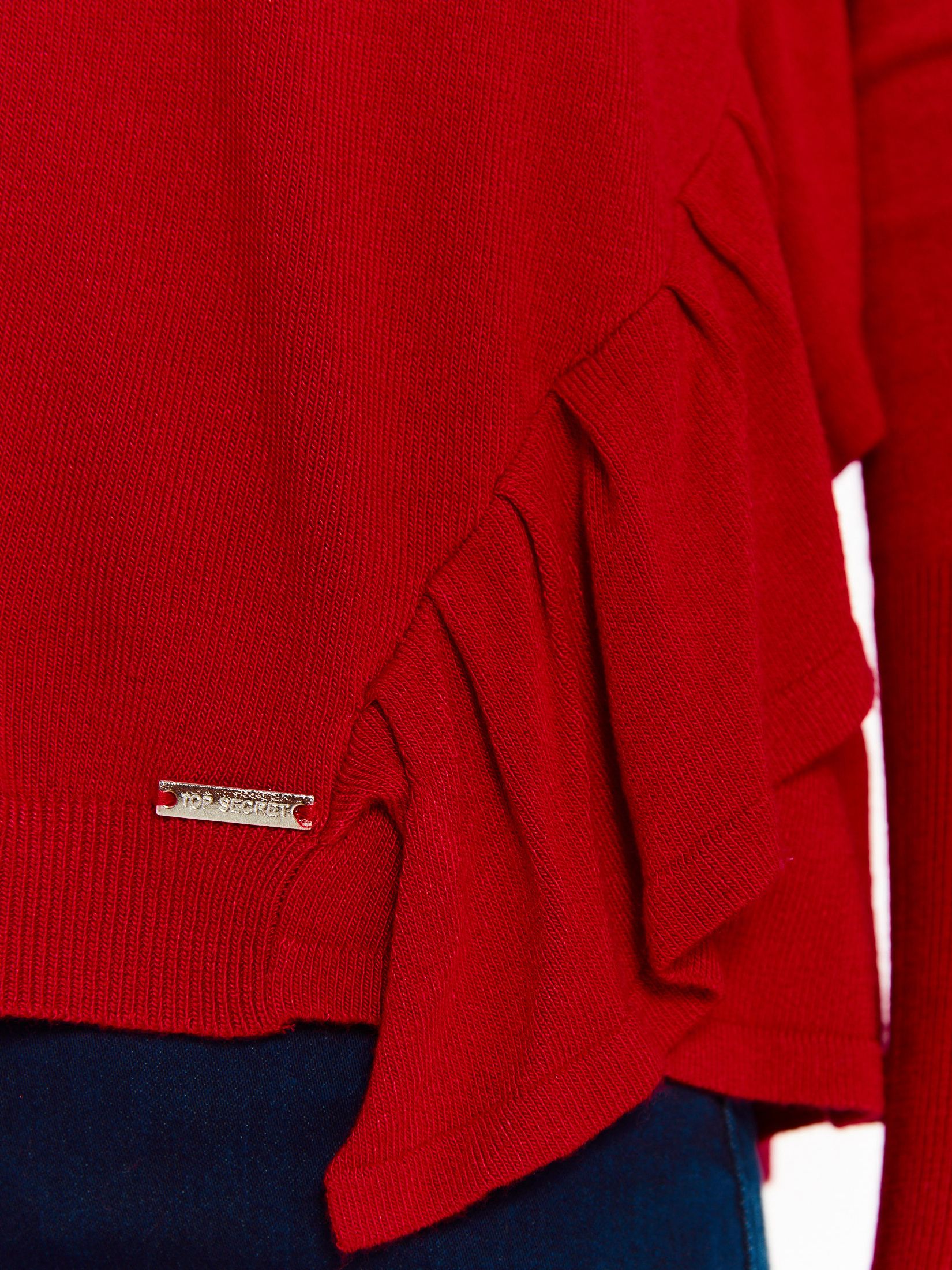 Sweter damski z ukośnymi falbanami