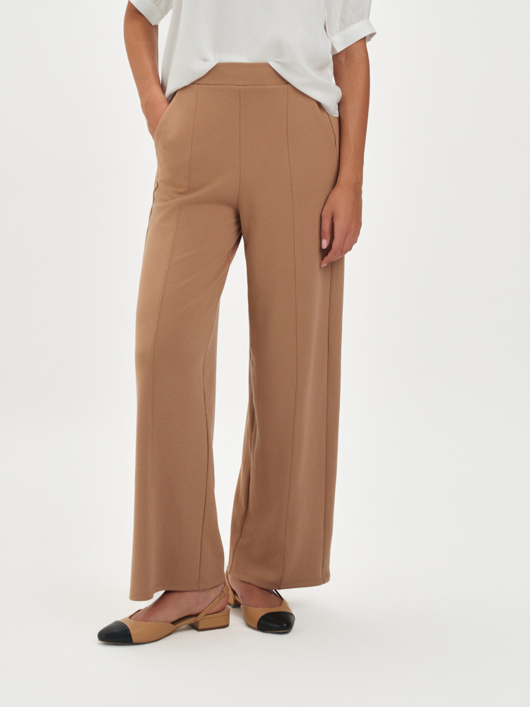 Beżowe tkaninowe spodnie 