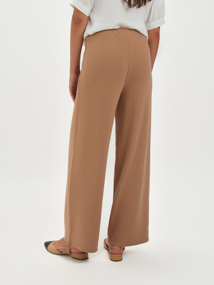 Beżowe tkaninowe spodnie 