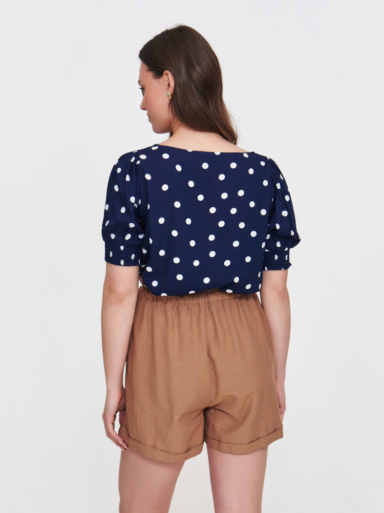 Granatowa bluzka w białe grochy 