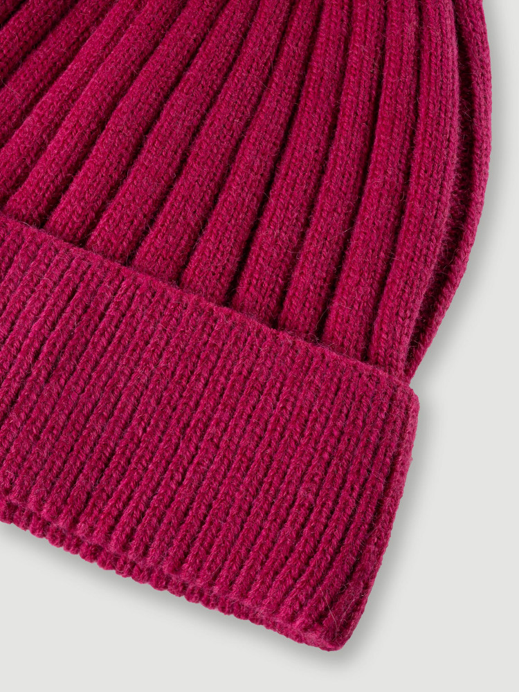 Różowa czapka pomponem 