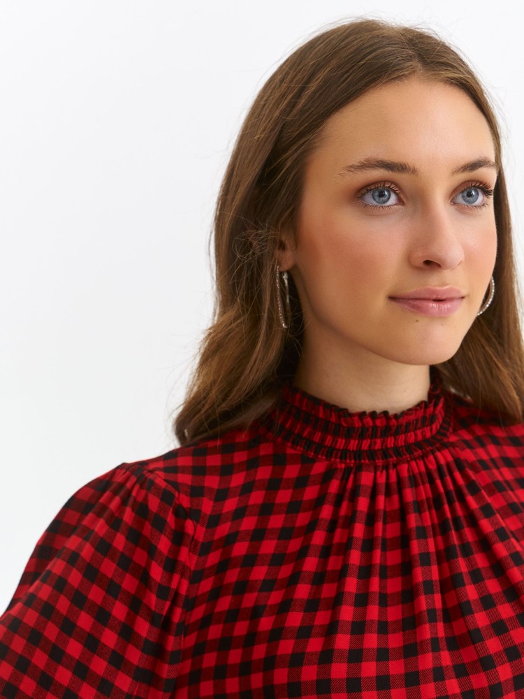 Bluzka w kratę z ozdobnym mankietem i golfem Bluzka w kratę z ozdobnym mankietem i golfem