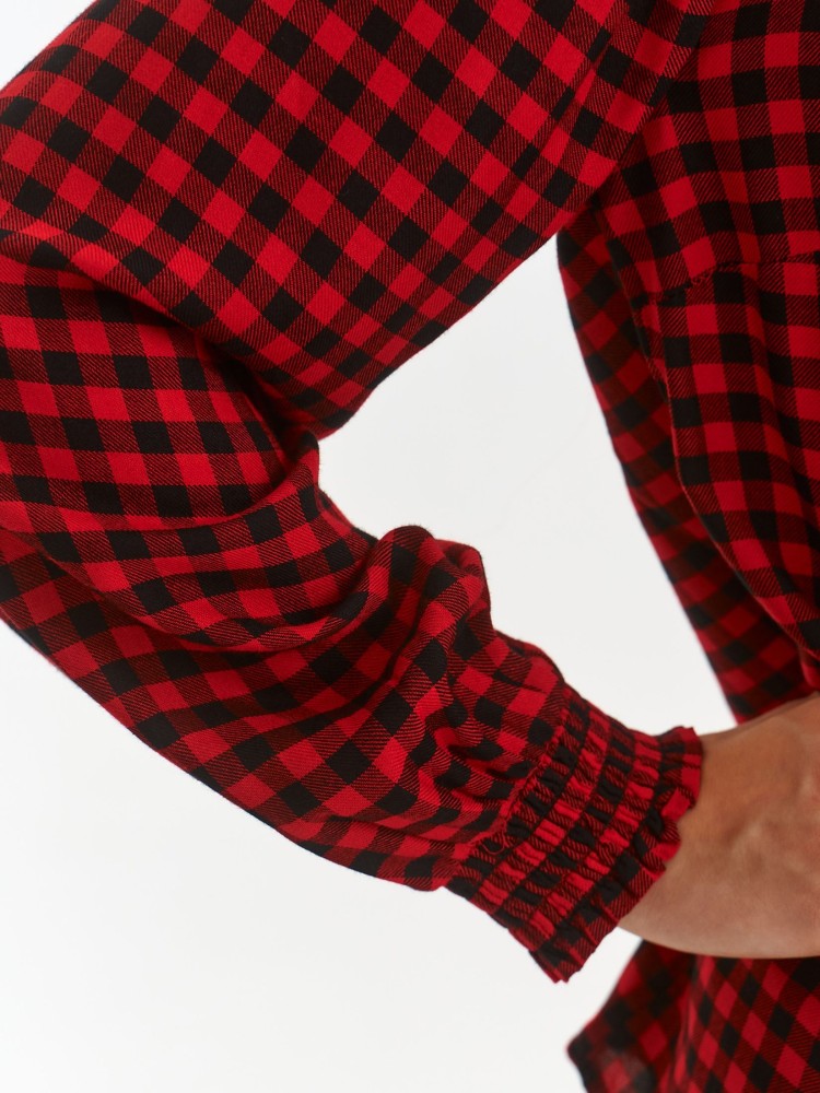 Bluzka w kratę z ozdobnym mankietem i golfem Bluzka w kratę z ozdobnym mankietem i golfem