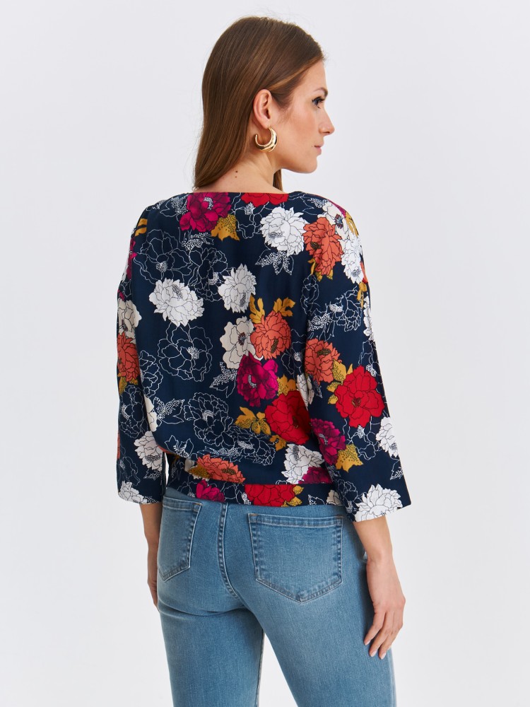 Bluzka damska w kwiaty z wiązaniem na dole Bluzka damska w kwiaty z wiązaniem na dole