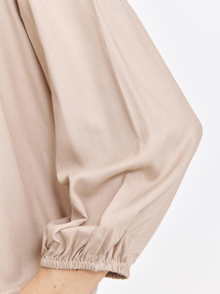 Luźna beżowa bluzka z gumką w rękawie