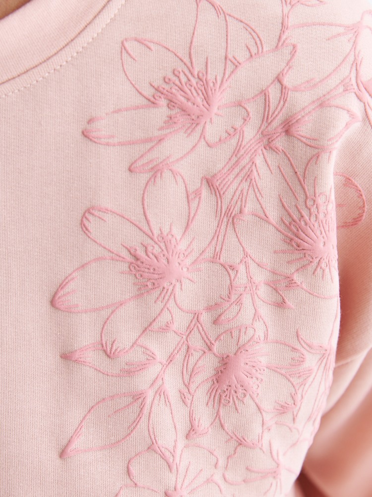 Bluza różowa z ozdobną aplikacją