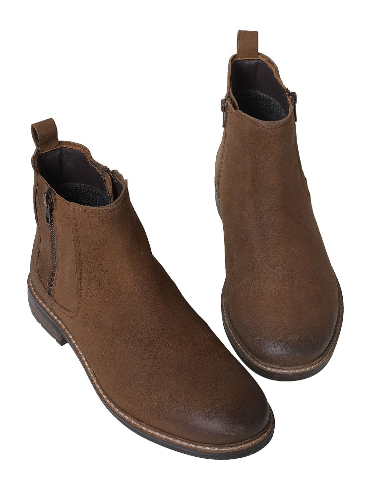 Skórzane botki na grubej podeszwie