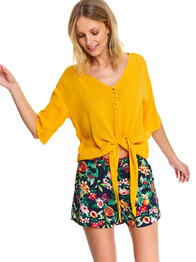 Luźna koszula wiązana na dole