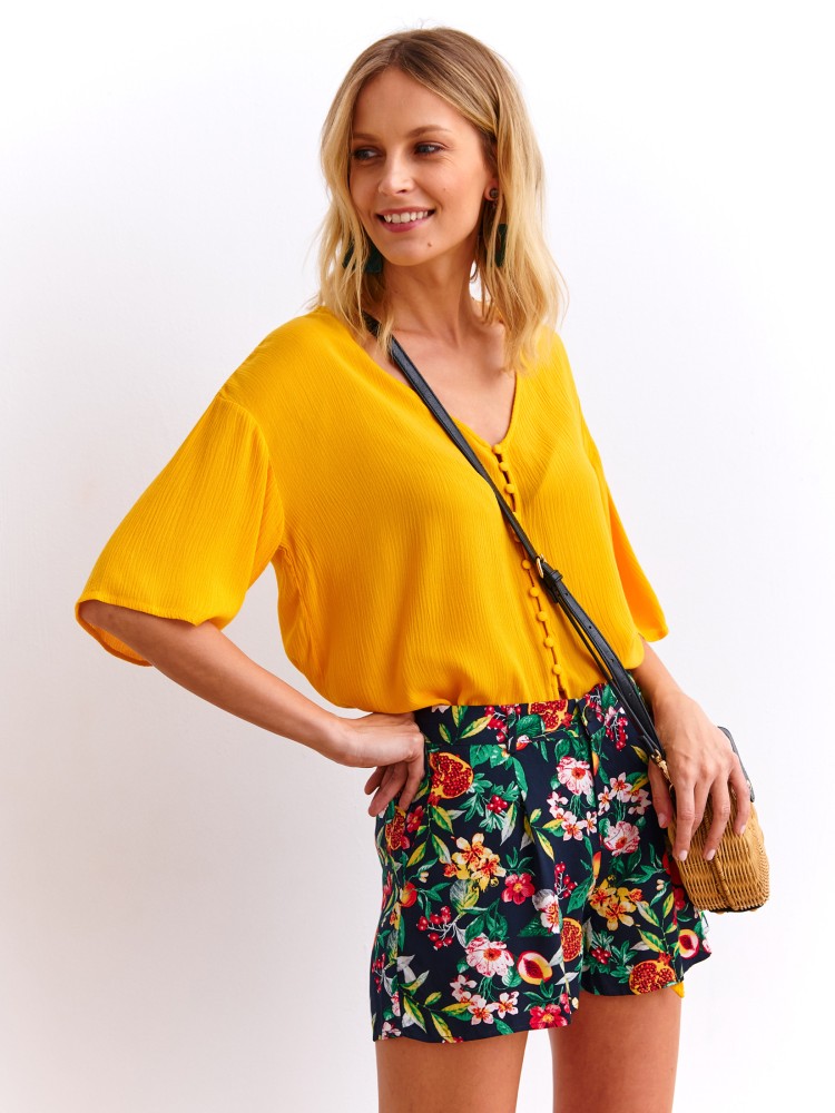 Luźna koszula wiązana na dole