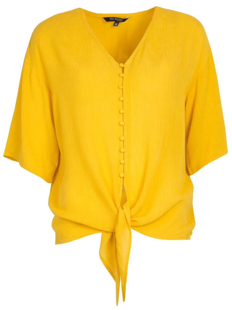 Luźna koszula wiązana na dole