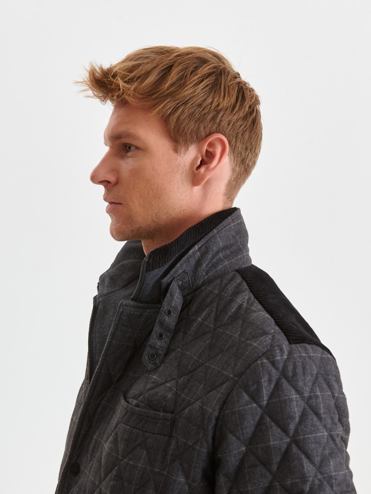 Kurtka w kratę pikowana