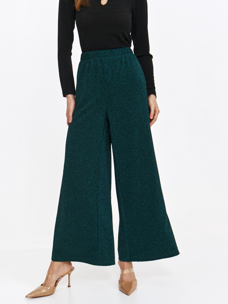 Błyszczące spodnie damskie 