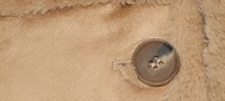 Kożuch damski z kołnierzem i wiązaniem