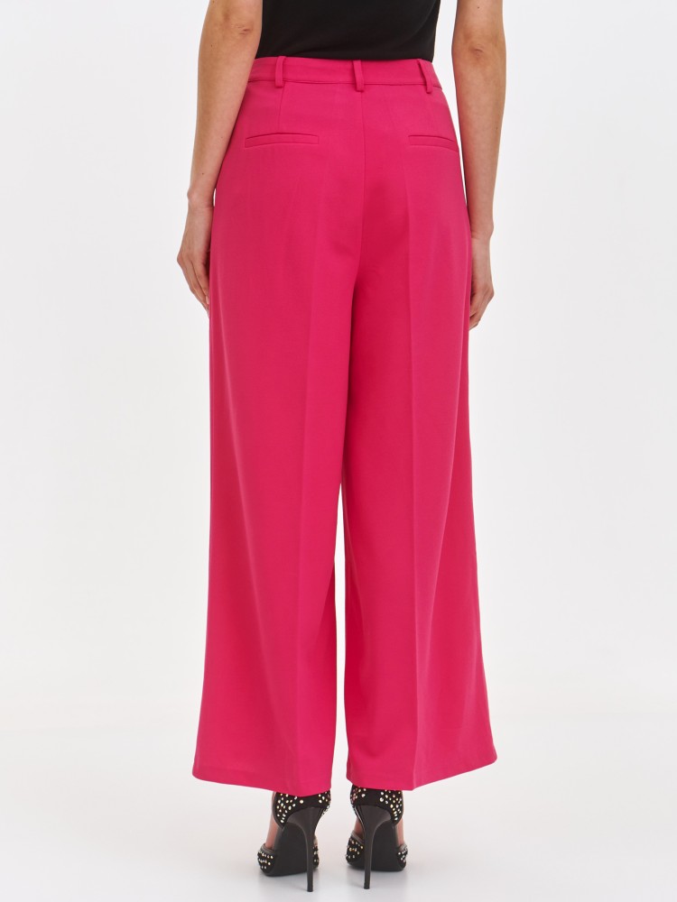 Szerokie różowe spodnie damskie wide leg Szerokie różowe spodnie damskie wide leg