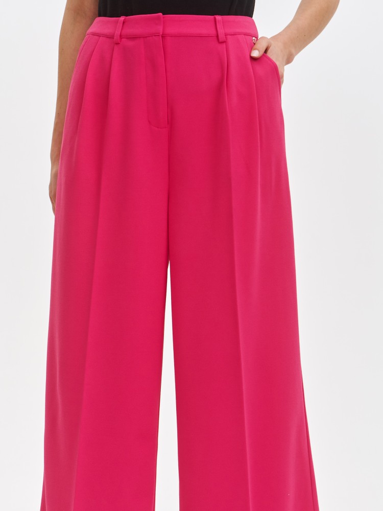 Szerokie różowe spodnie damskie wide leg Szerokie różowe spodnie damskie wide leg