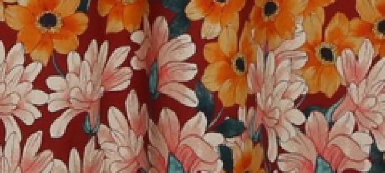 Sukienka maxi w kwiatowy wzór zdobiona falbaną