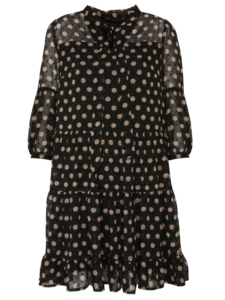 Sukienka w grochy z wiązaniem pod szyją i falbaną