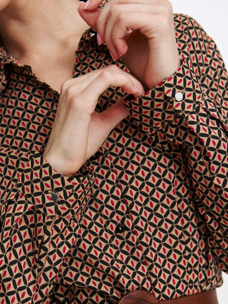 Elegancka szmizjerka w retro wzór