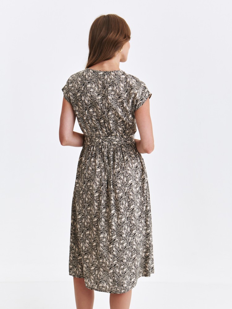 Sukienka w drobny wzór z wiązaniem pod szyją