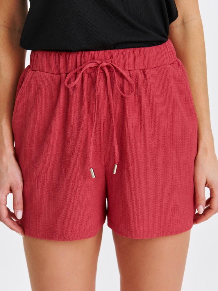 Różowe szorty damskie z wiązaniem Różowe szorty damskie z wiązaniem