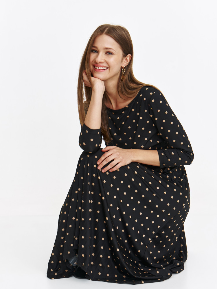 Sukienka w grochy z plisowanym dołem 