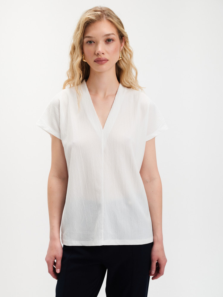 Biała bluzka z dekoltem v-neck 