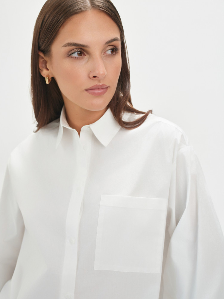 Biała koszula z dłuższym tyłem 
