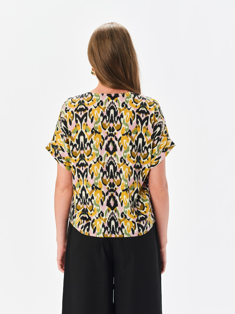 Żółta bluzka z efektownym printem 