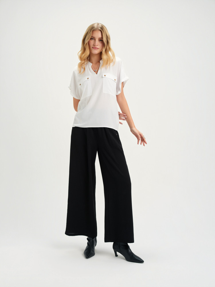 Biała bluzka z kieszeniami 