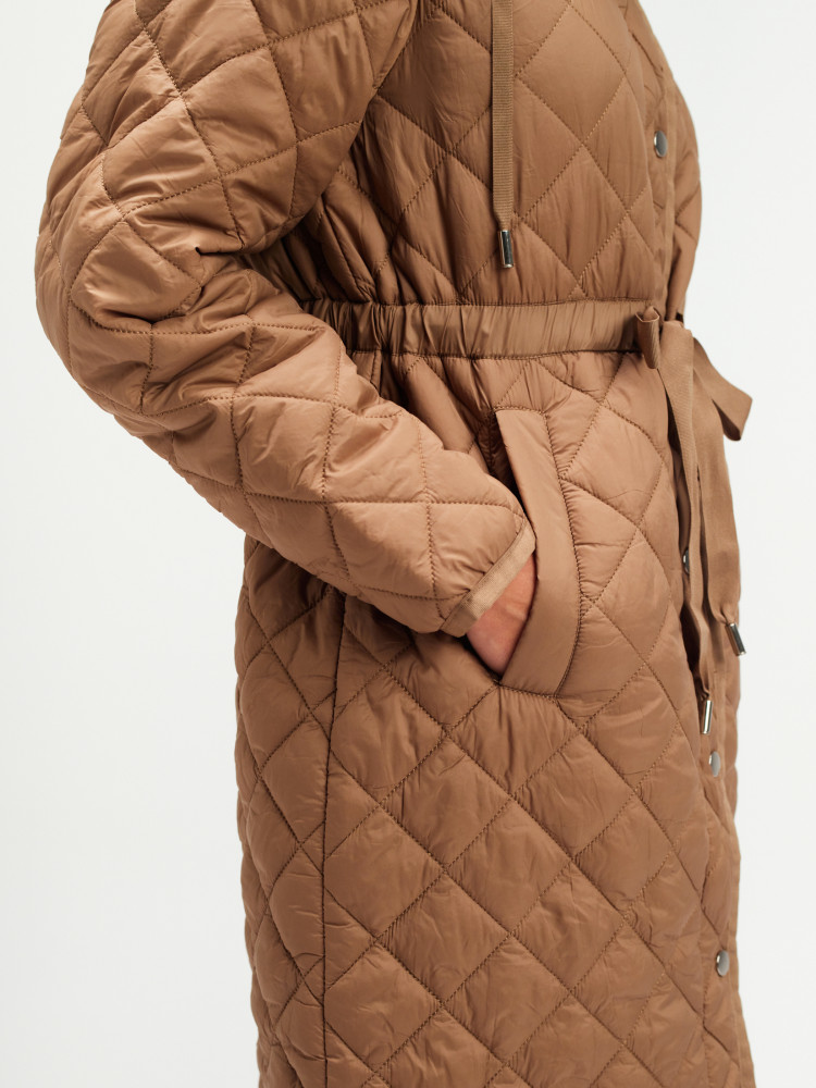 Długa pikowana kurtka beżowa 