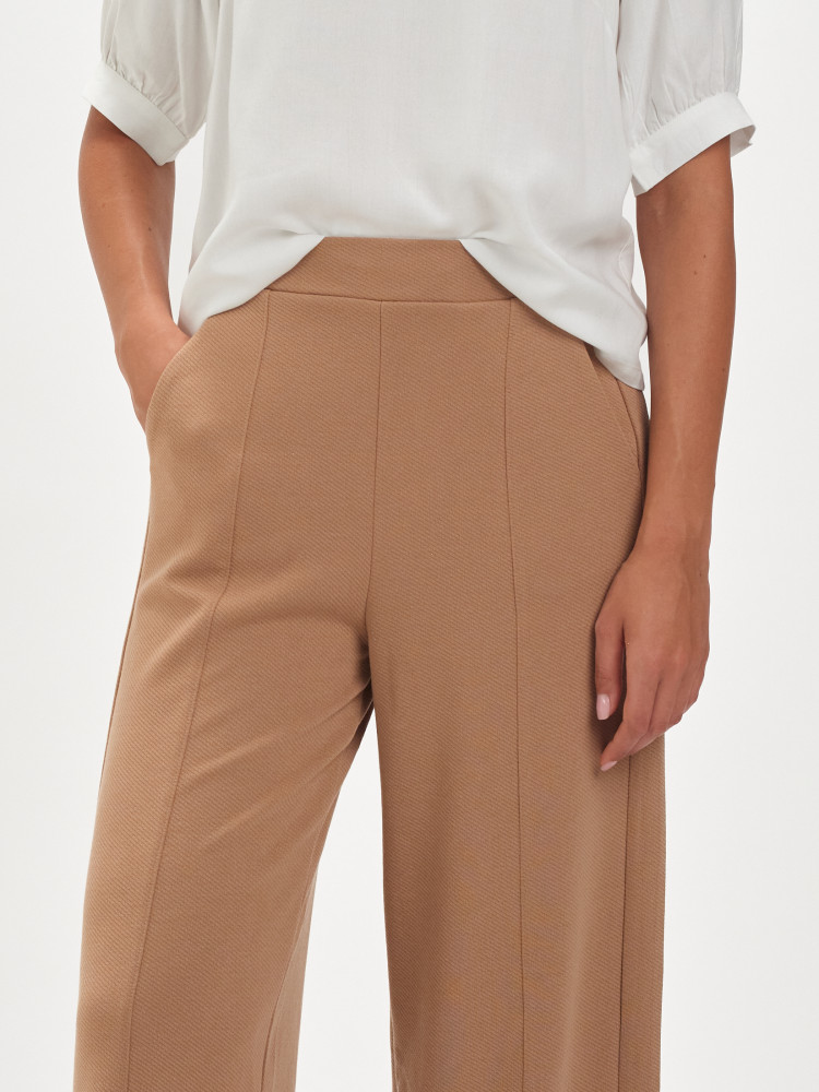 Beżowe tkaninowe spodnie 