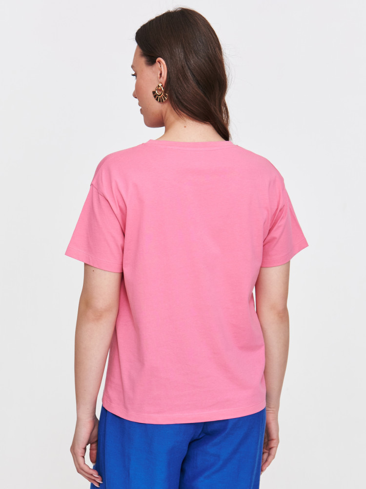 Różowy t-shirt z tropikalnym nadrukiem 