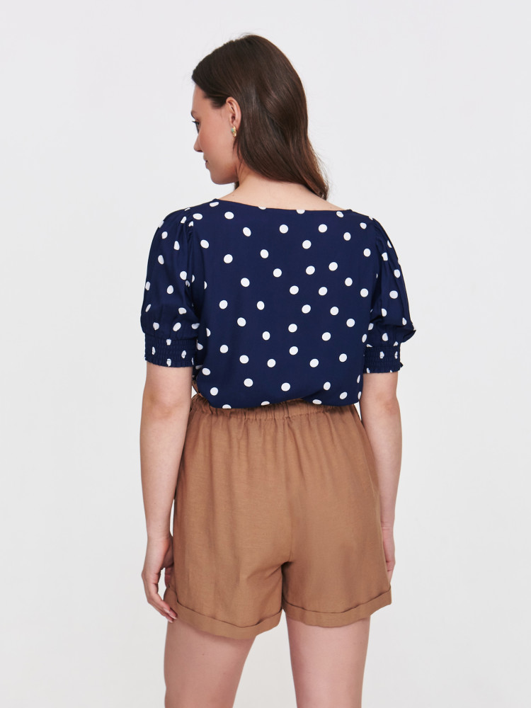 Granatowa bluzka w białe grochy 