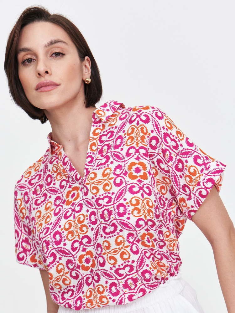 Bluzka z grafiką w kolorze różowo-pomarańczowym 