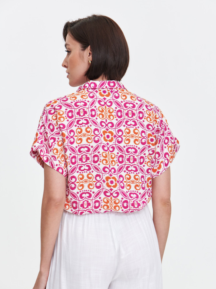 Bluzka z grafiką w kolorze różowo-pomarańczowym 