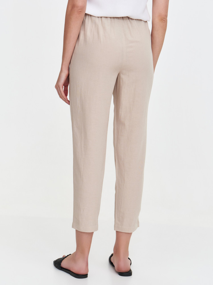 Tkaninowe beżowe spodnie typu chino 