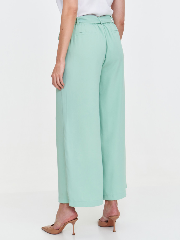 Miętowe spodnie z szeroką nogawką 
