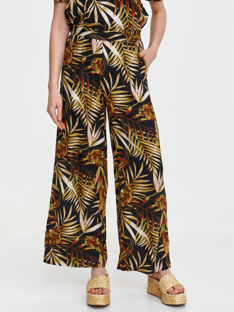 Wiskozowe spodnie z tropikalnym wzorem 