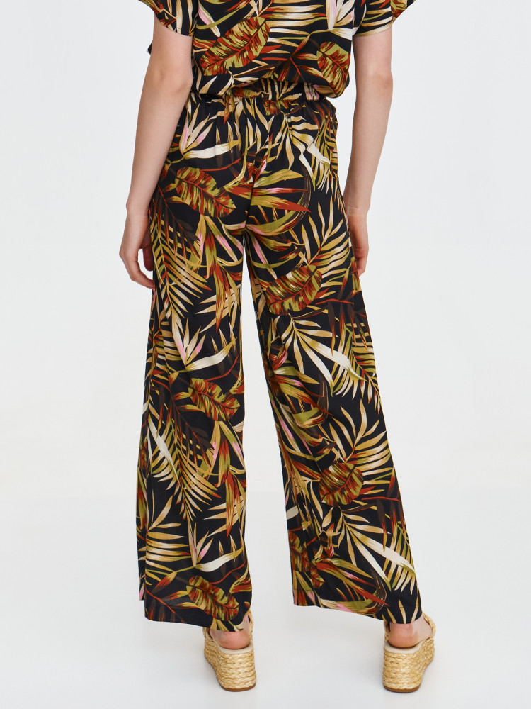 Wiskozowe spodnie z tropikalnym wzorem 