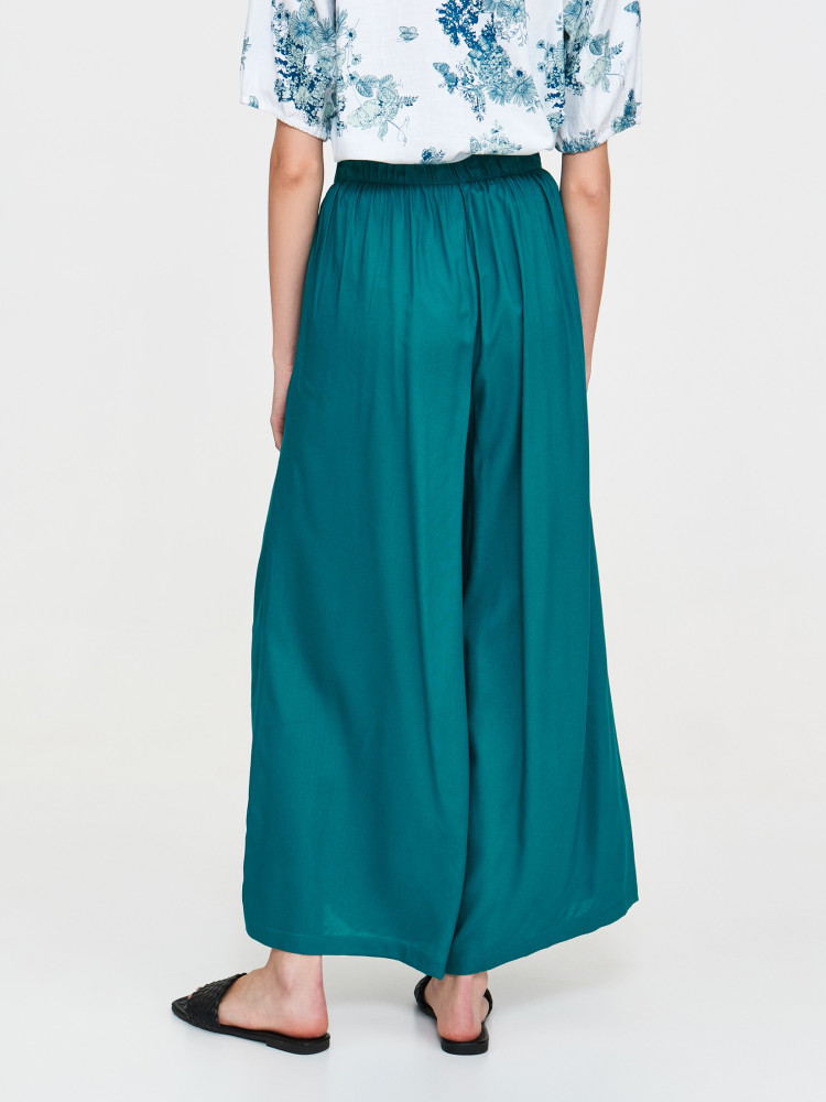 Tkaninowe zielone spodnie z szeroką nogawką 