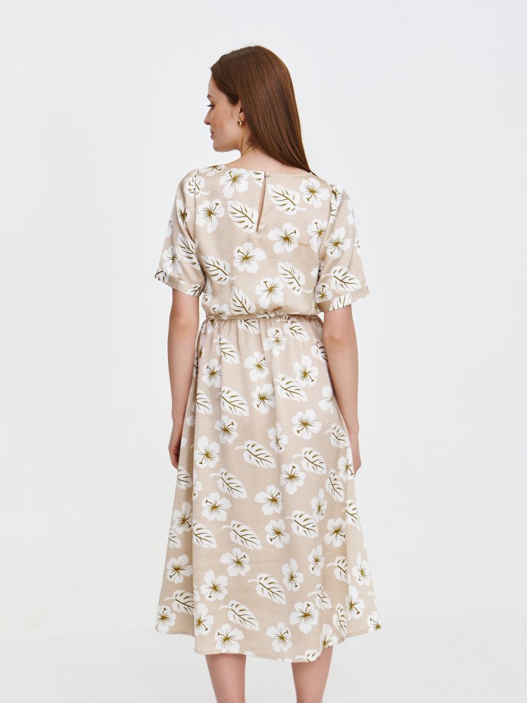 Beżowa sukienka w jasne kwiaty  Beżowa sukienka w jasne kwiaty