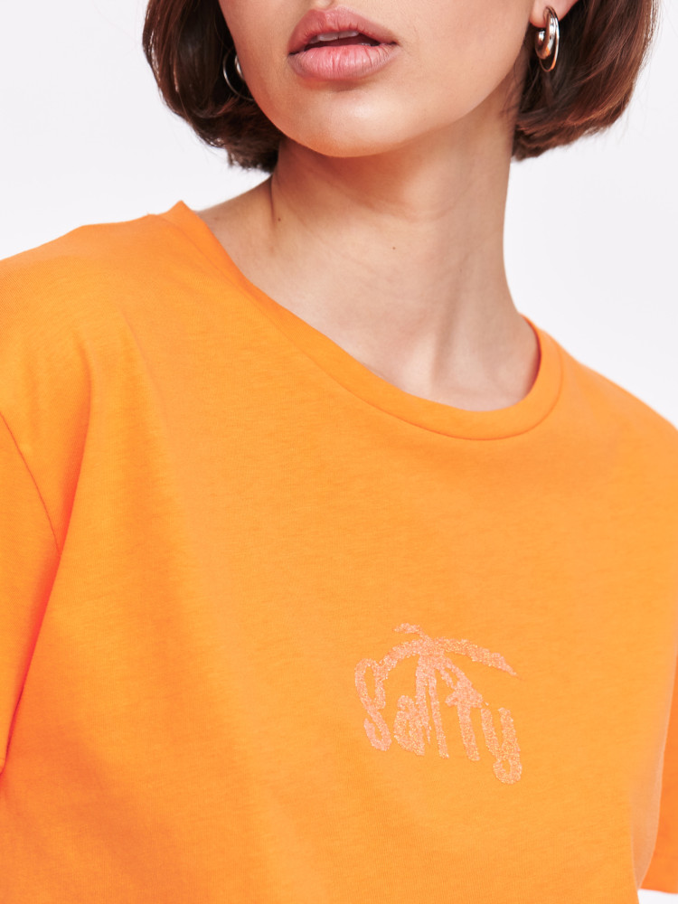 Pomarańczowy top z wytłaczaną grafiką 