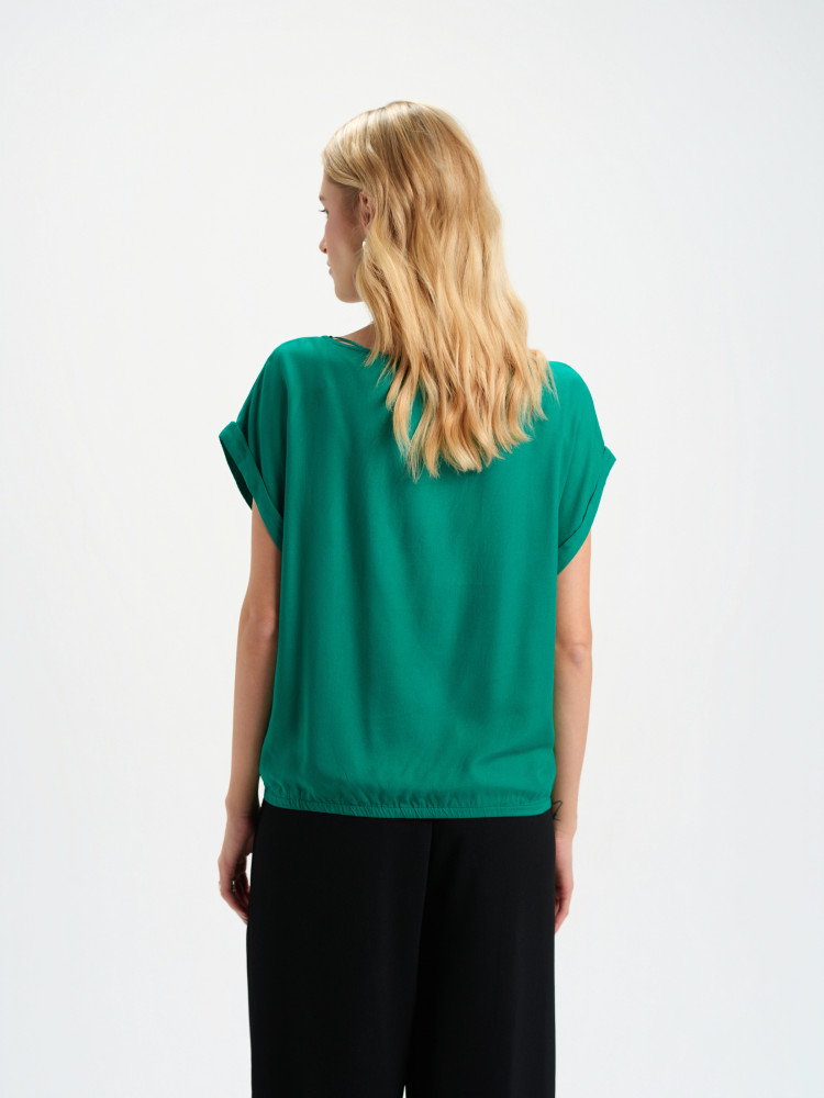 Zielona bluzka z gumką u dołu 