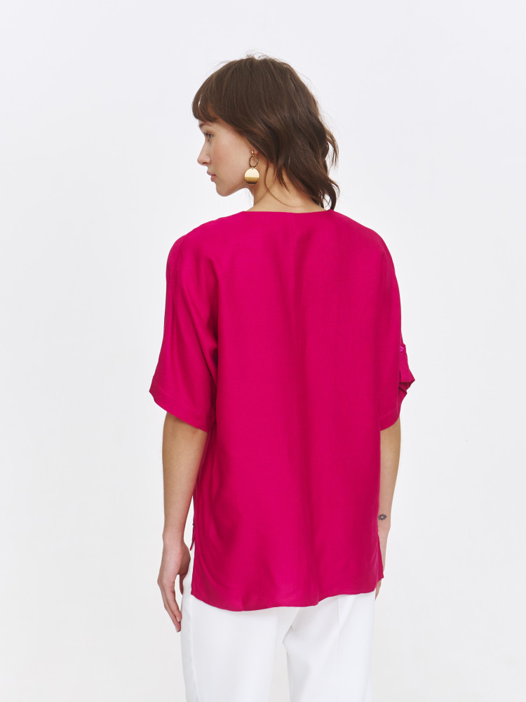 Różowa bluzka z dłuższym tyłem 