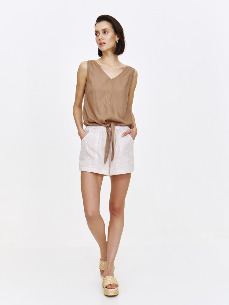 Beżowa bluzka z wiązaniem u dołu 