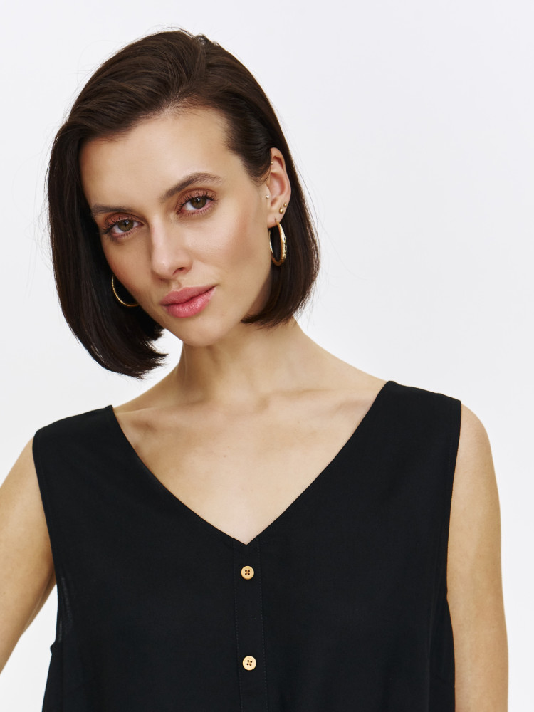 Czarna bluzka z wiązaniem u dołu 