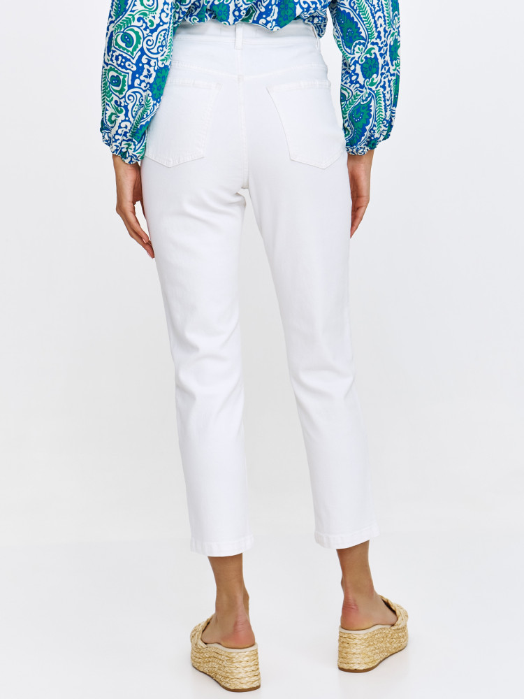 Białe spodnie jeansowe typu skinny 