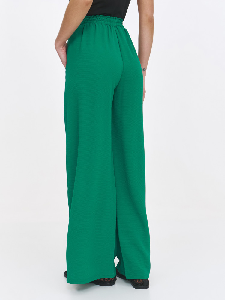 Zielone spodnie z szeroką nogawką
