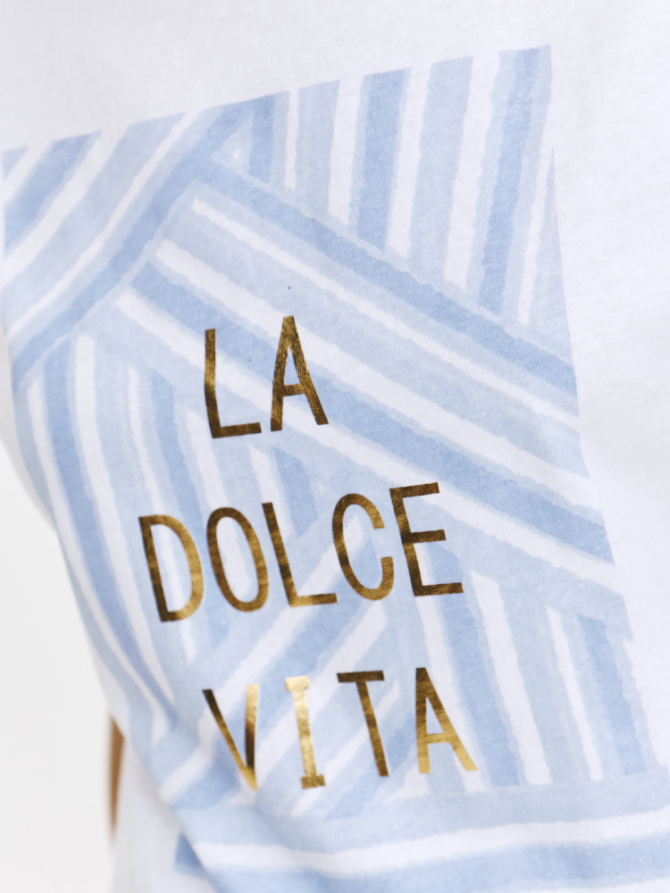 Biały top ze złotym napisem 