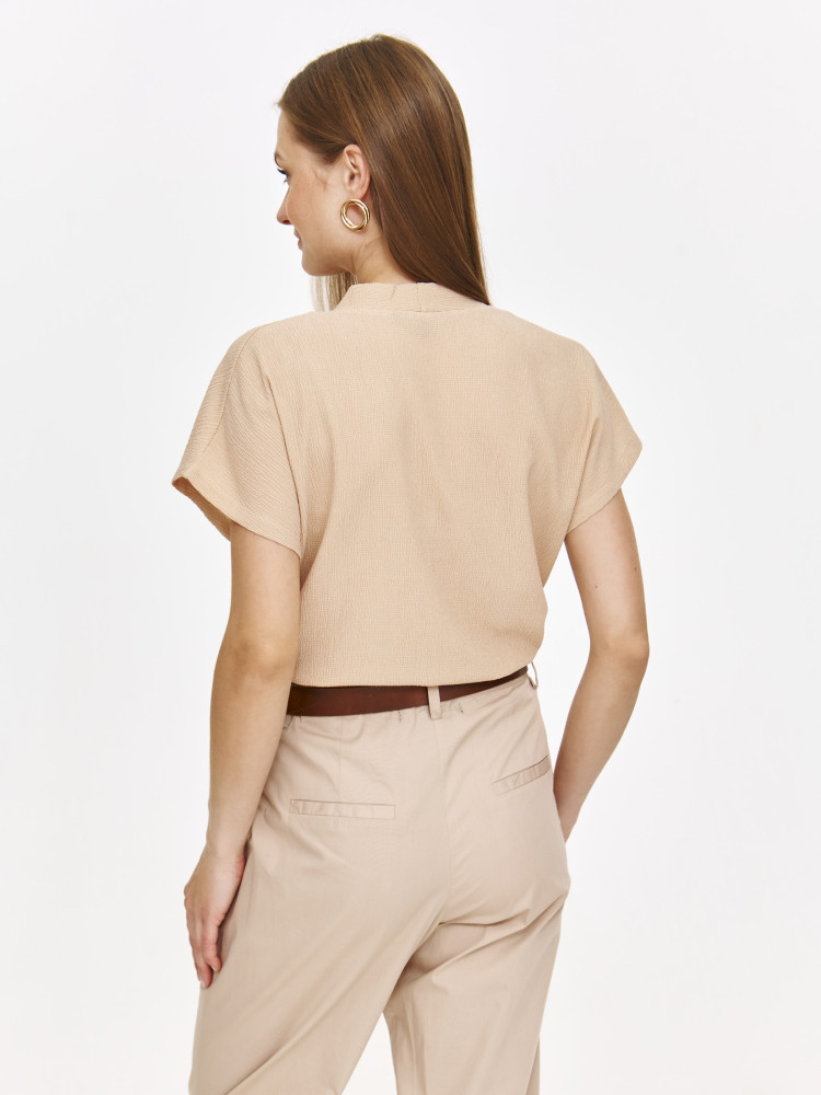 Beżowy top w stylu casual 